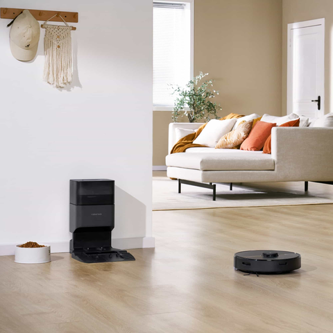 the Roborock S7+ robot vacuum on wooden floor