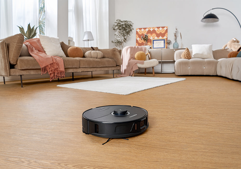 A black Roborock S8+ smart vacuum